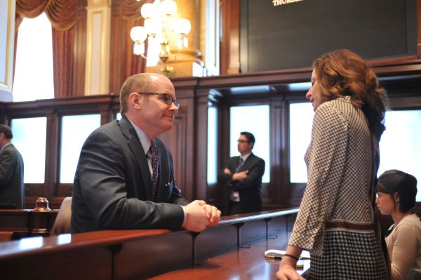 Harmon talking to a reporter